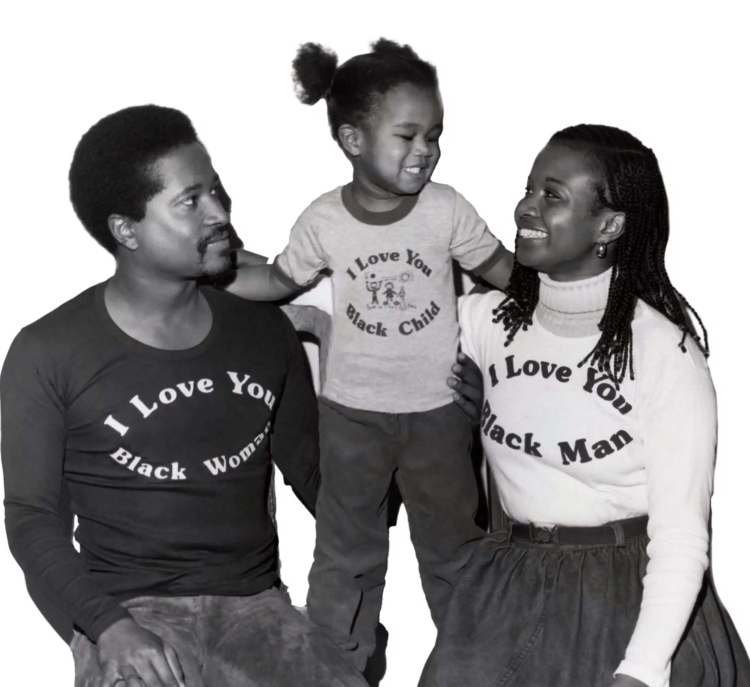 A man and two women with their arms around each other.