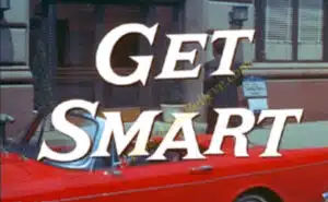 A red car with the words " get smart " written on it.