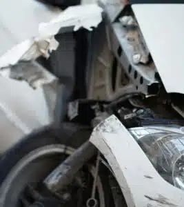 A motorcycle that has been smashed in to pieces.